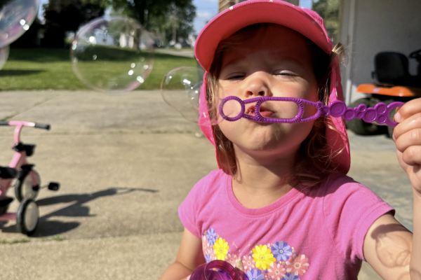 Wolfe Family Blowing Bubbles